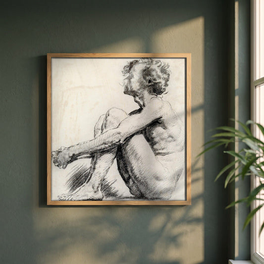 A Seated Male Figure by Sarah Purser framed print in a natural oak frame on a dark green wall beside a window, dappled plant shadow