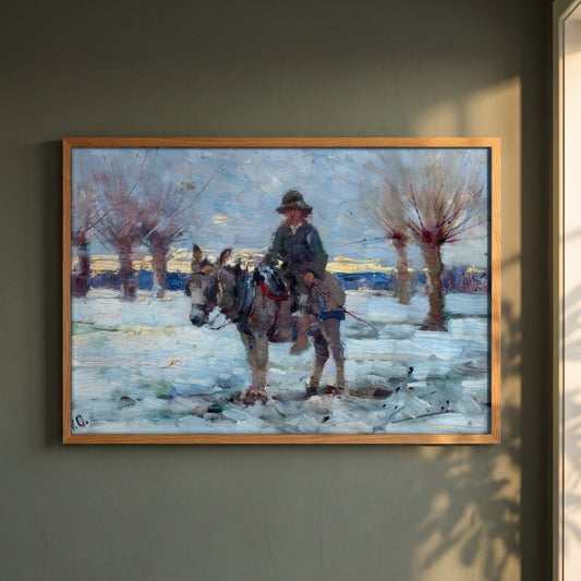 Boy on a Donkey in a Snowy Landscape by Walter Osborne framed print in a natural oak frame on a dark green wall beside a window, dappled plant shadow