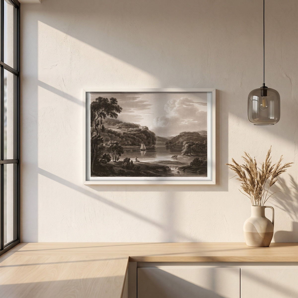 Dromana on the Blackwater by Thomas Sautelle Roberts Art Print framed print in a white frame on a plaster wall above an oak worktop in a bright Scandinavian kitchen