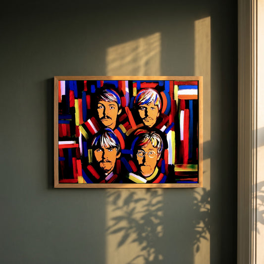 The Beatles Fab Four framed print in a natural oak frame on a dark green wall beside a window, dappled plant shadow