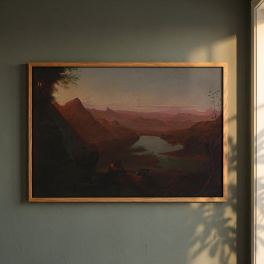 The Painter's Holiday framed print in a natural oak frame on a dark green wall beside a window, dappled plant shadow