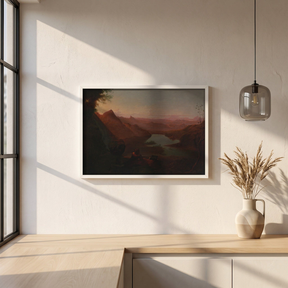 The Painter's Holiday framed print in a white frame on a plaster wall above an oak worktop in a bright Scandinavian kitchen