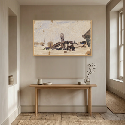 A Kneeling Man on the Beach art print, framed and hung in a hallway