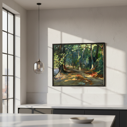 John Lavery woodland path painting framed print in a black frame above a white kitchen counter