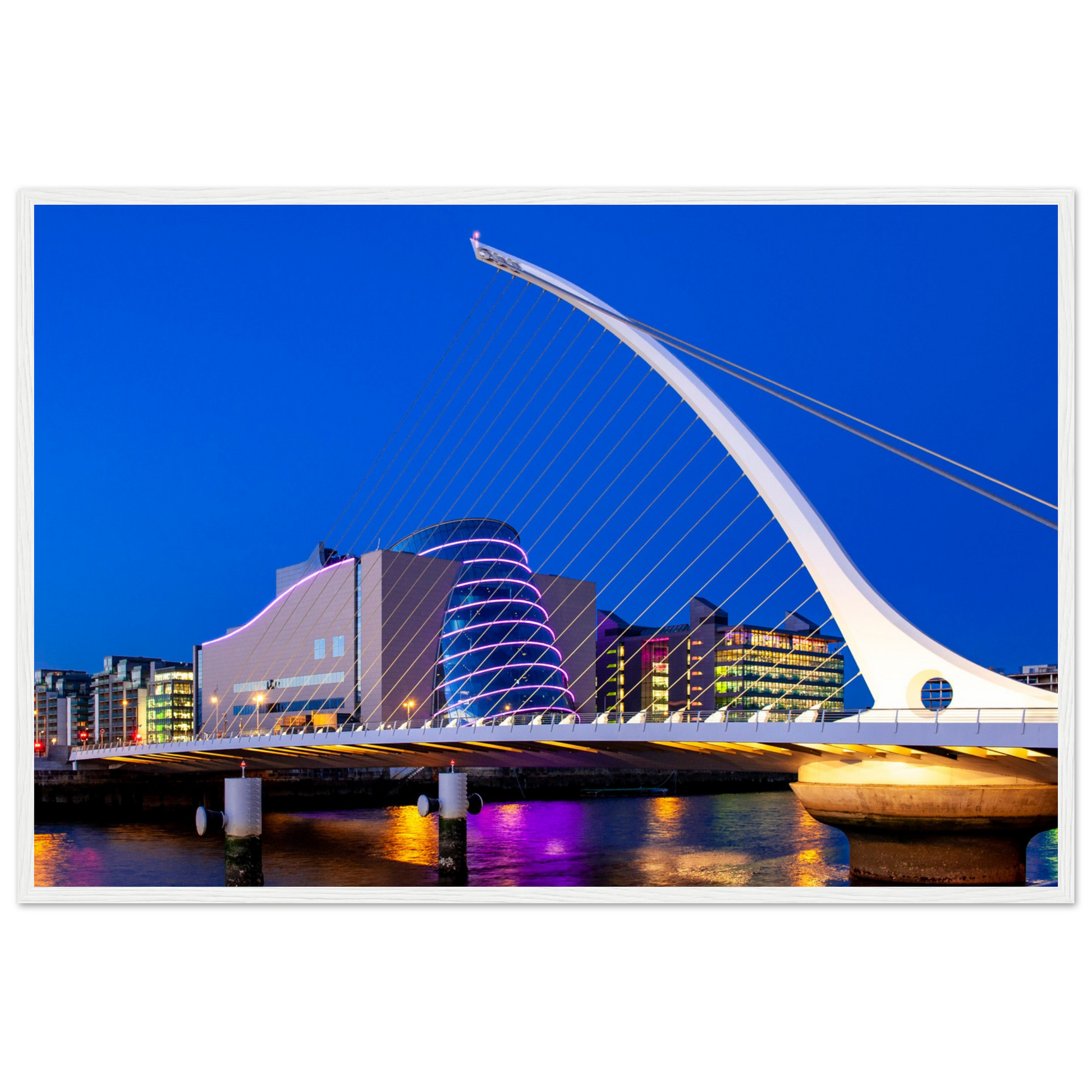 Enchanting Dublin skyline at night: Samuel Beckett Bridge & Convention Centre lights reflected on River Liffey. Framed art print captures city's magic.