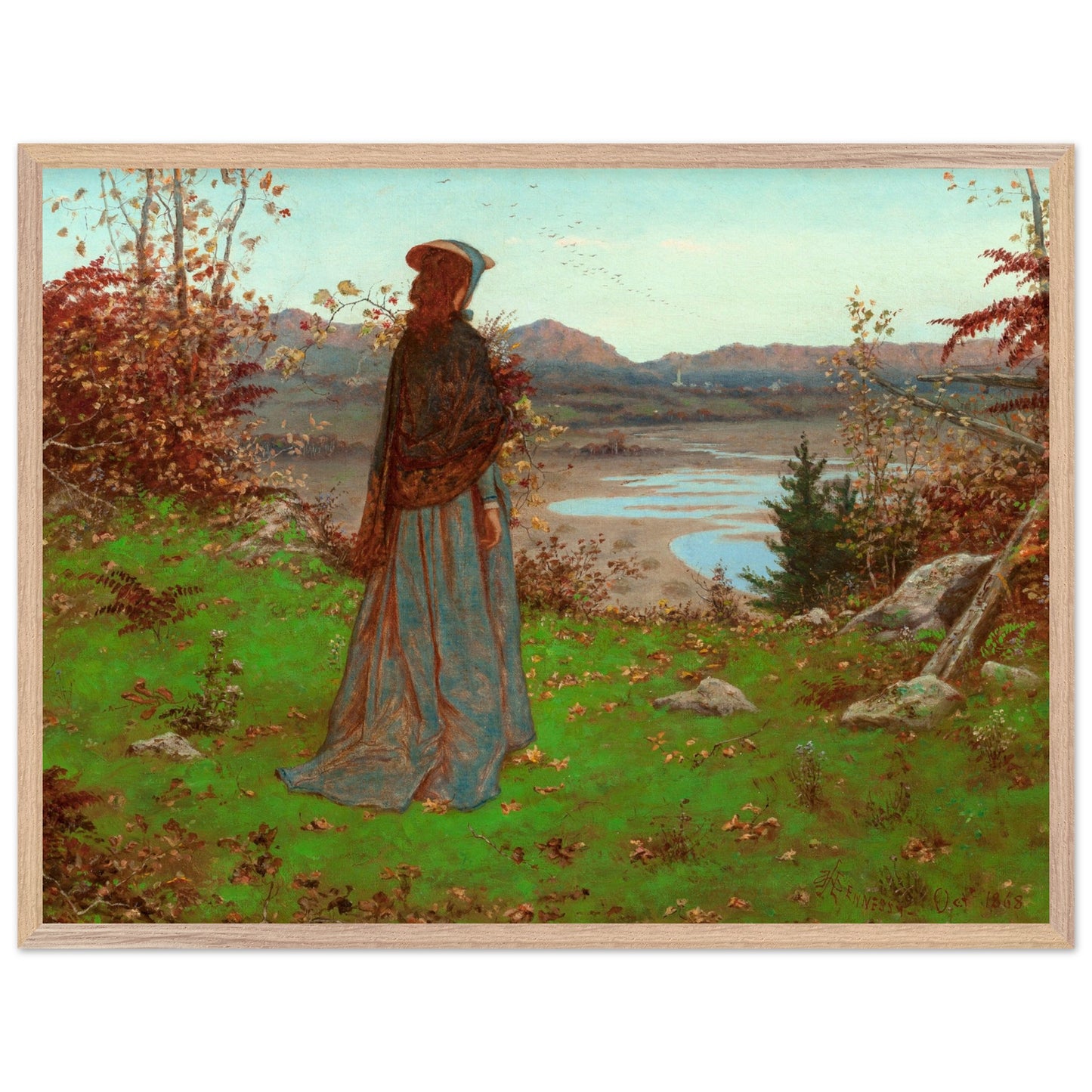 Woman in an Autumn Landscape – William J. Hennessy Irish Art Print Natural oak frame displayed in a cosy reading nook.