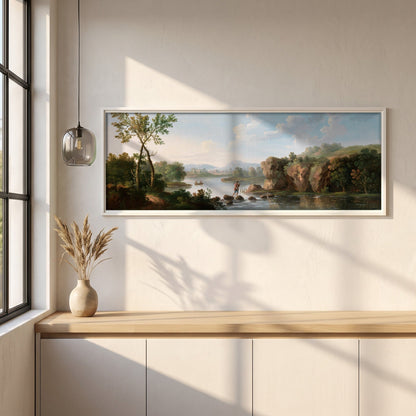 A Landscape with a Man Fording a Stream framed print in a white frame on a plaster wall above an oak worktop in a bright Scandinavian kitchen