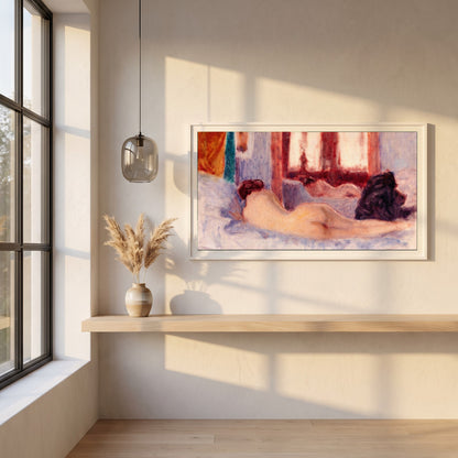 A Reclining Figure before a Mirror framed print in a white frame on a plaster wall above an oak worktop in a bright Scandinavian kitchen