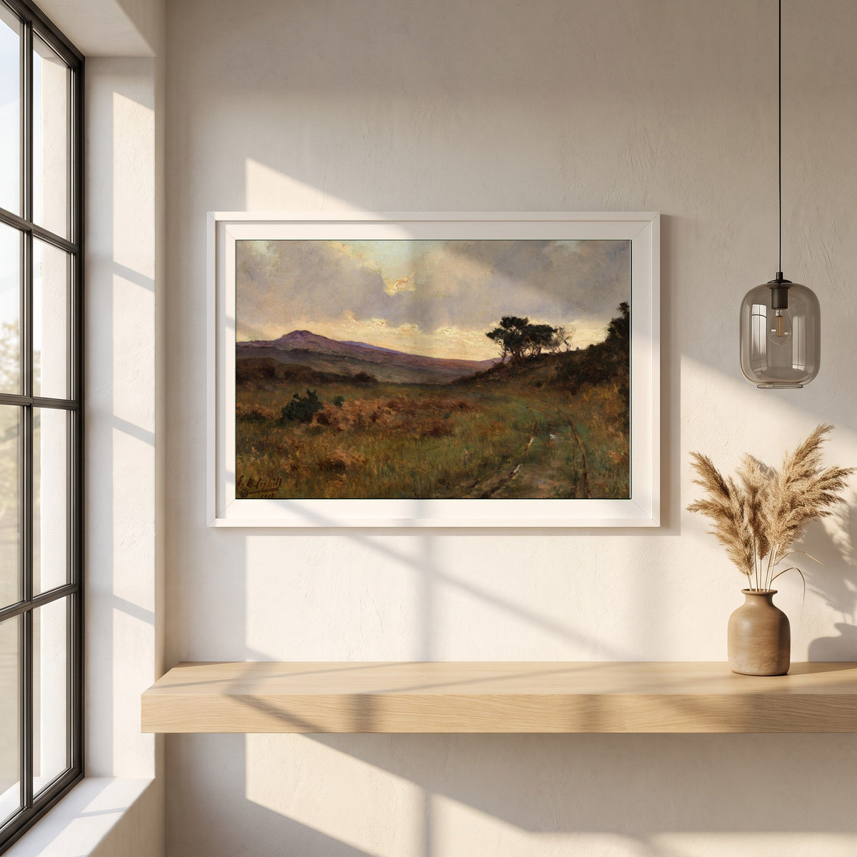 Castletownshend, County Cork framed print in a white frame on a plaster wall above an oak worktop in a bright Scandinavian kitchen