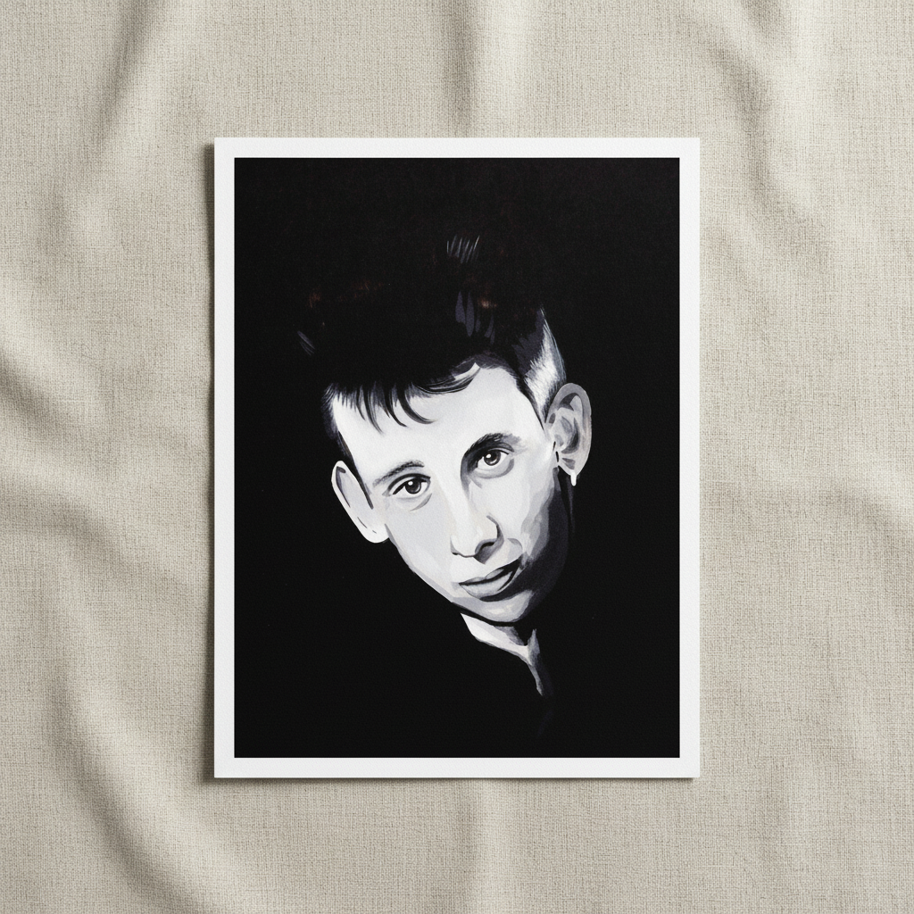 Shane MacGowan portrait unframed print with a white border lying on cream linen