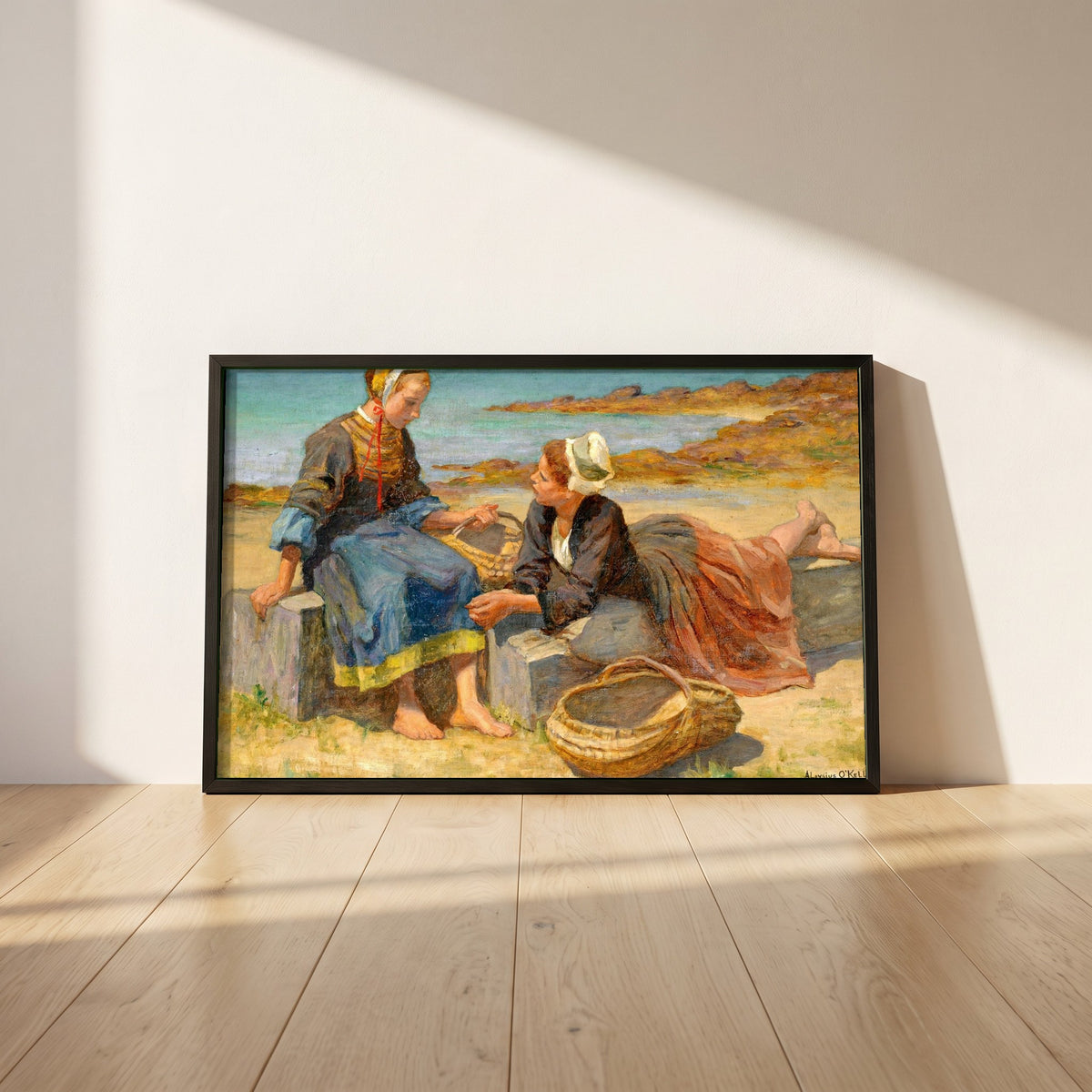 Breton Girls On a Beach By Irish Artist Aloysius O'Kelly framed print in a black frame leaning against a white plaster wall on oak floorboards in morning light