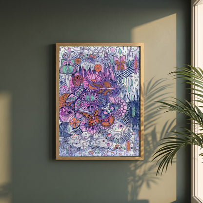 Harry Clarke Butterfly Print | Sefton Fabrics Belfast 1918 framed print in a natural oak frame on a dark green wall beside a window, dappled plant shadow