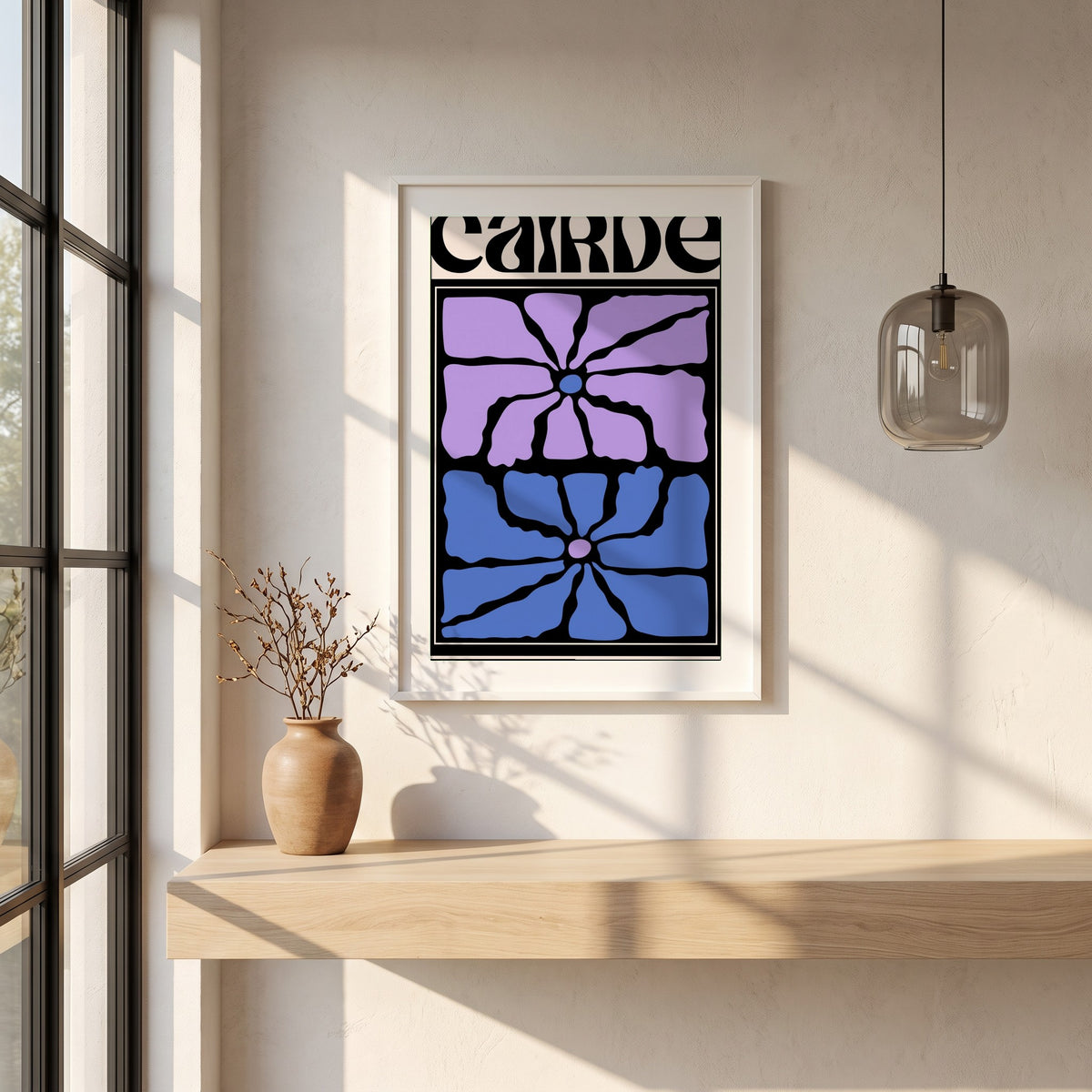 Cairde framed print in a white frame on a plaster wall above an oak worktop in a bright Scandinavian kitchen