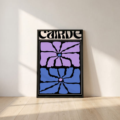 Cairde framed print in a black frame leaning against a white plaster wall on oak floorboards in morning light