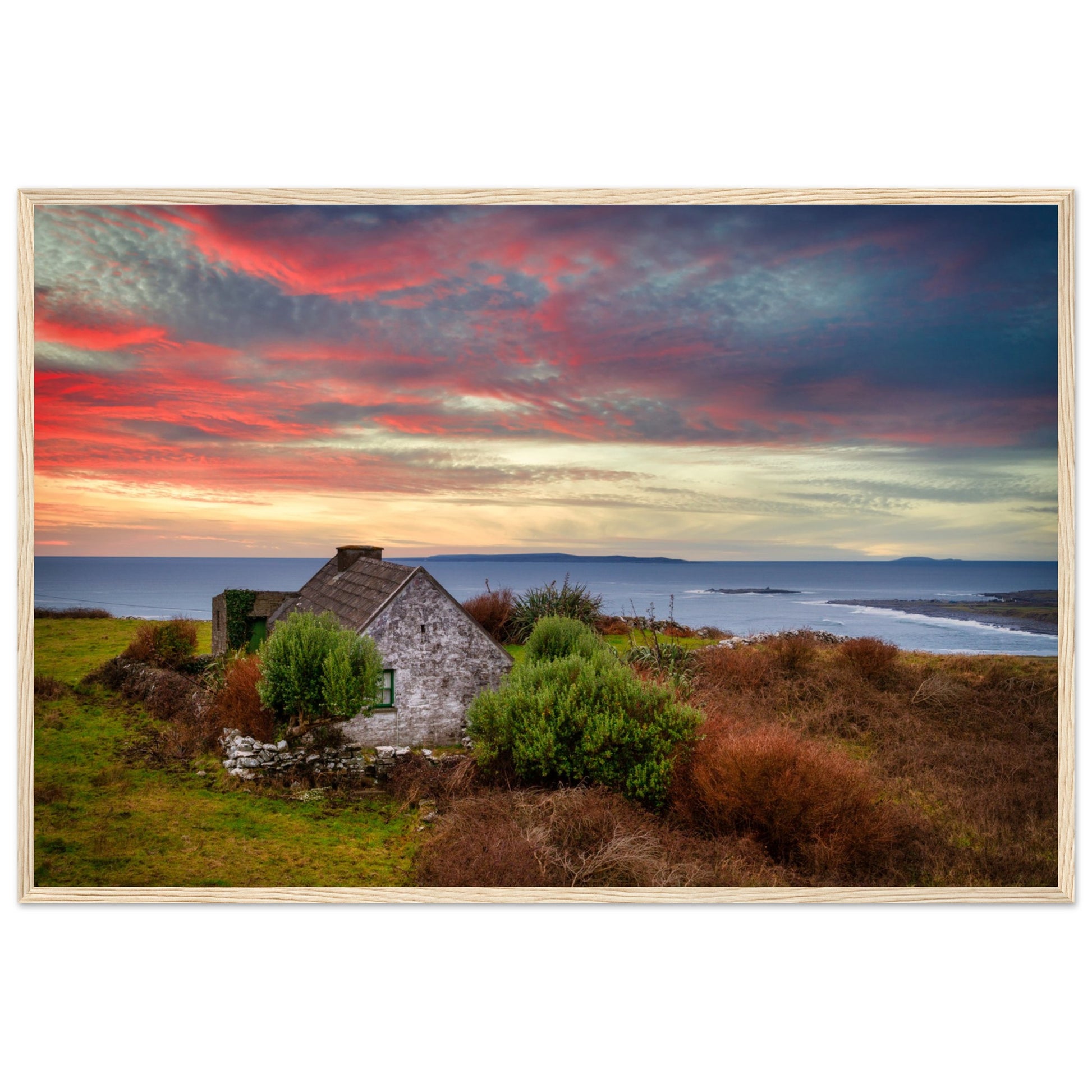 Art print capturing a serene sunset over the Atlantic Ocean in Doolin, Co. Clare, Ireland. A small cottage stands in the foreground, blending with the colorful sky reflecting on the water.