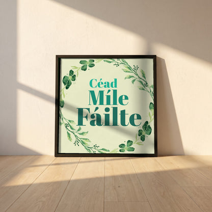 Céad Míle Fáilte framed print in a black frame leaning against a white plaster wall on oak floorboards in morning light