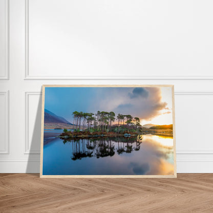 Twelve Pines, Derryclare Lough photographic print in a light oak frame leaning on a panelled wall