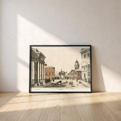 Dublin Castle Gate framed print in a black frame leaning against a white plaster wall on oak floorboards in morning light