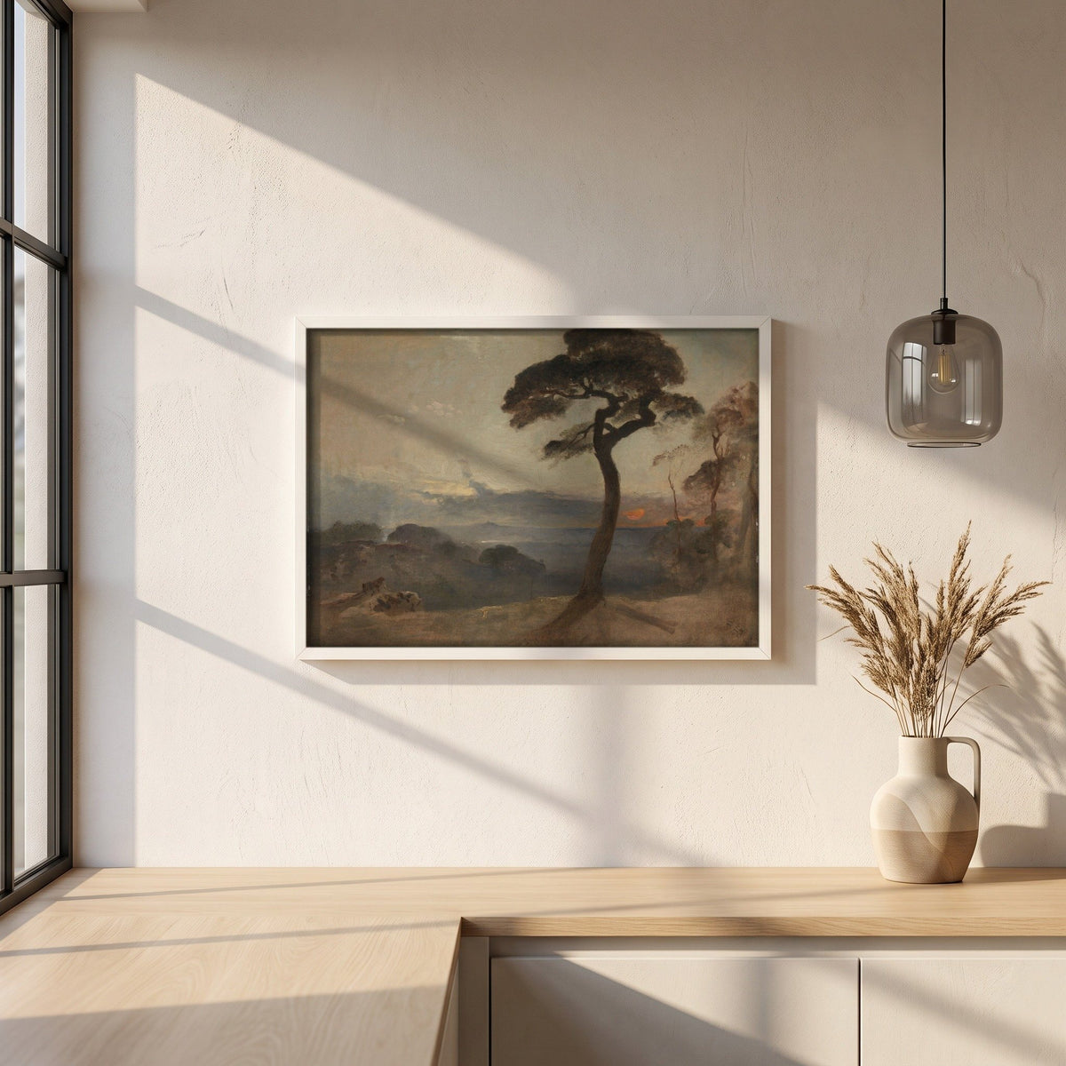 Hampstead Heath, Sunset framed print in a white frame on a plaster wall above an oak worktop in a bright Scandinavian kitchen
