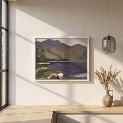 Loch Katrine framed print in a white frame on a plaster wall above an oak worktop in a bright Scandinavian kitchen