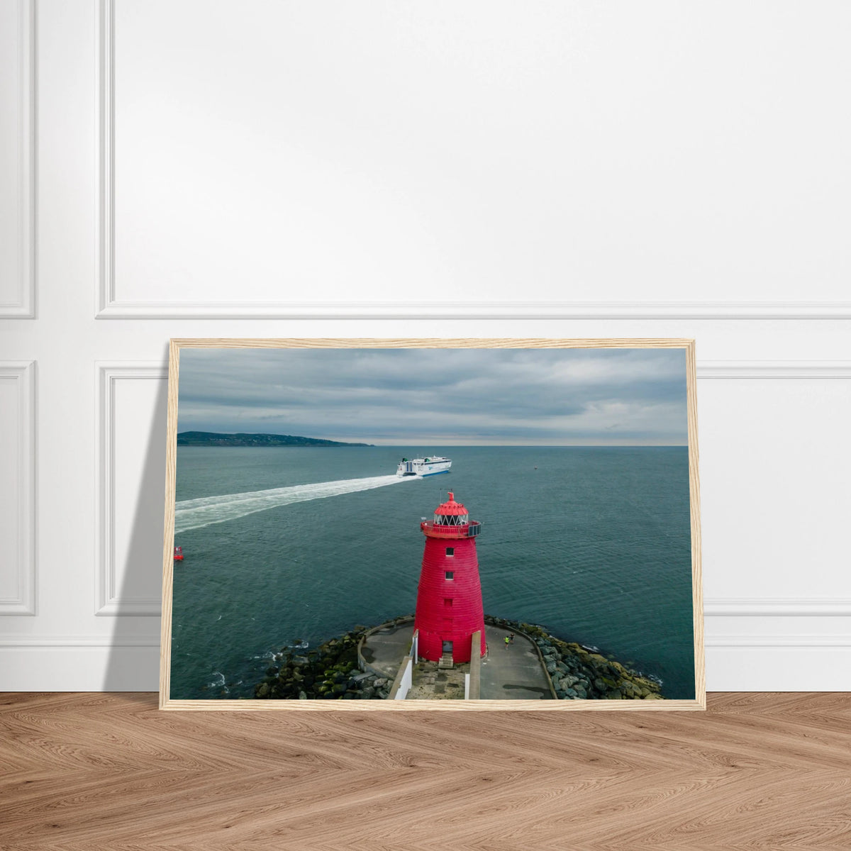Poolbeg Lighthouse, Dublin Bay photo in an oak frame on a wooden floor, straight-on view