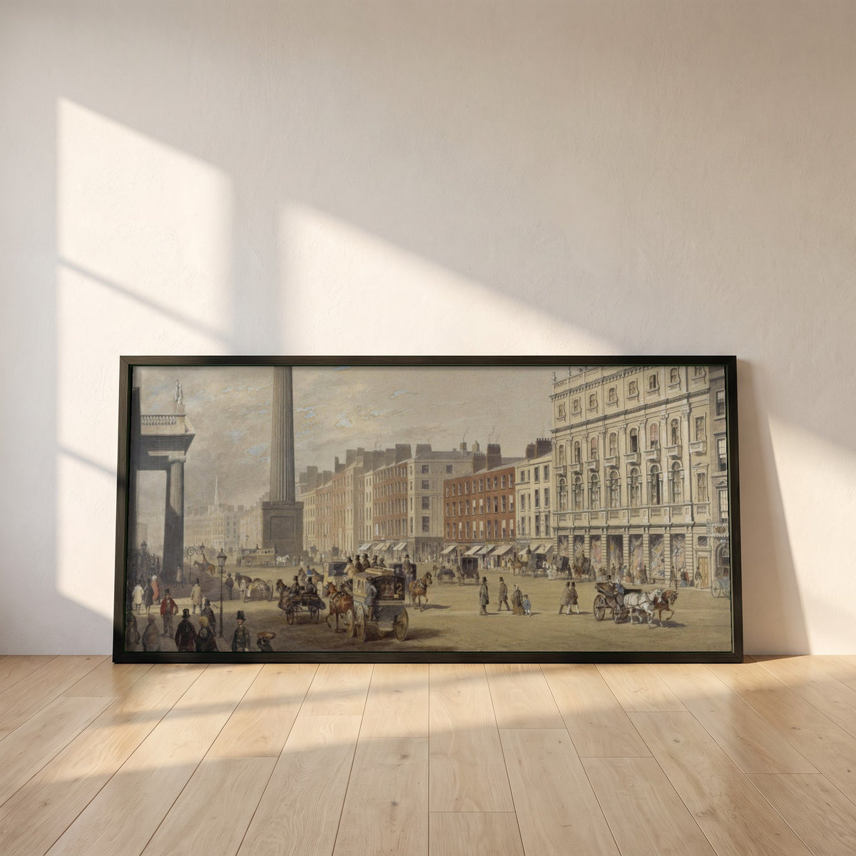 Sackville Street, Dublin framed print in a black frame leaning against a white plaster wall on oak floorboards in morning light