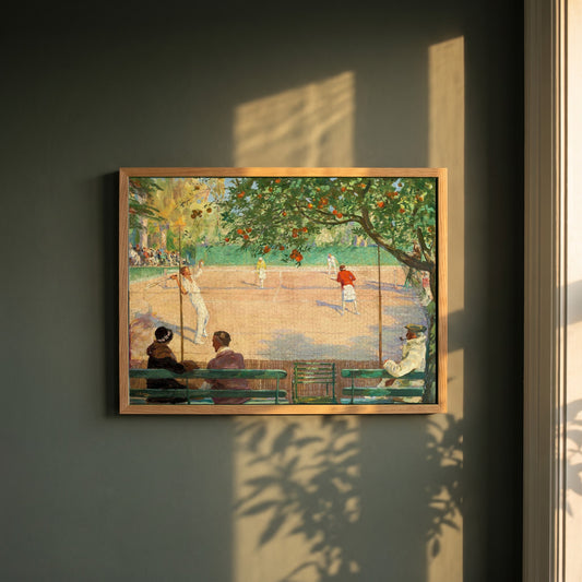 Sir John Lavery framed print in a natural oak frame on a dark green wall beside a window, dappled plant shadow