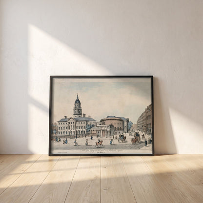 The Rotunda & Rutland Square, Dublin framed print in a black frame leaning against a white plaster wall on oak floorboards in morning light