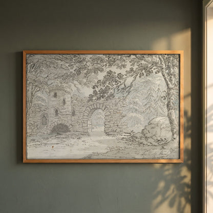The Rustic Arch, Luttrelstown Castle framed print in a natural oak frame on a dark green wall beside a window, dappled plant shadow