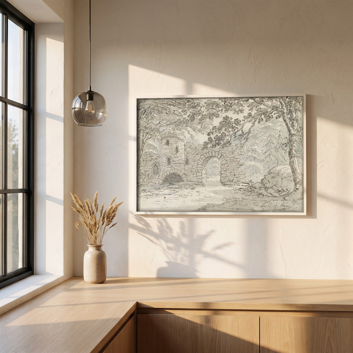 The Rustic Arch, Luttrelstown Castle framed print in a white frame on a plaster wall above an oak worktop in a bright Scandinavian kitchen