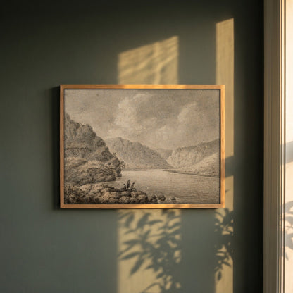 The Upper Lake, Glendalough framed print in a natural oak frame on a dark green wall beside a window, dappled plant shadow