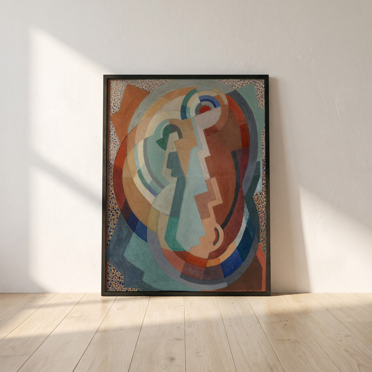 The Virgin and Child framed print in a black frame leaning against a white plaster wall on oak floorboards in morning light