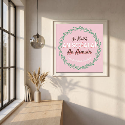 Time Is A Good Storyteller framed print in a white frame on a plaster wall above an oak worktop in a bright Scandinavian kitchen