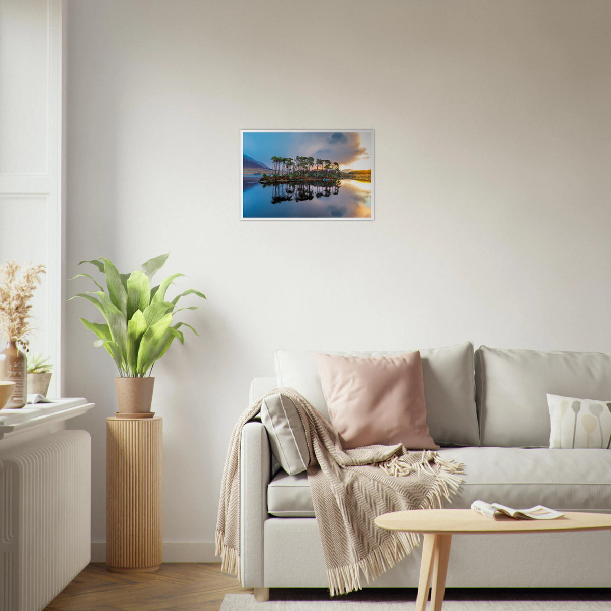 Twelve Pines Connemara photo print in a white frame above a cream sofa in a bright living room