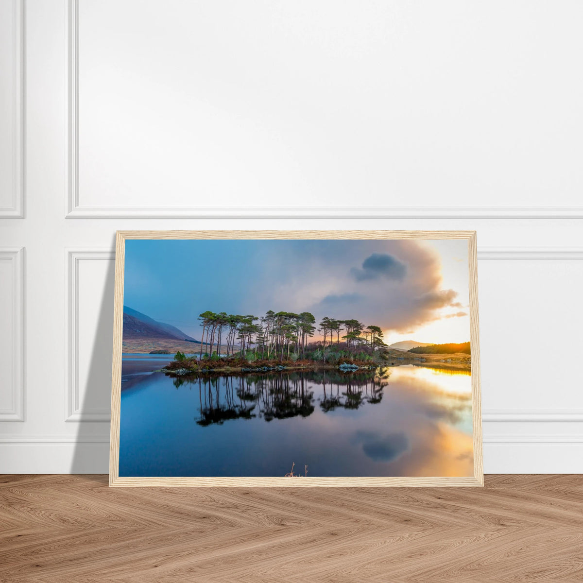 Twelve Pines, Derryclare Lough print in a natural wood frame on a herringbone floor